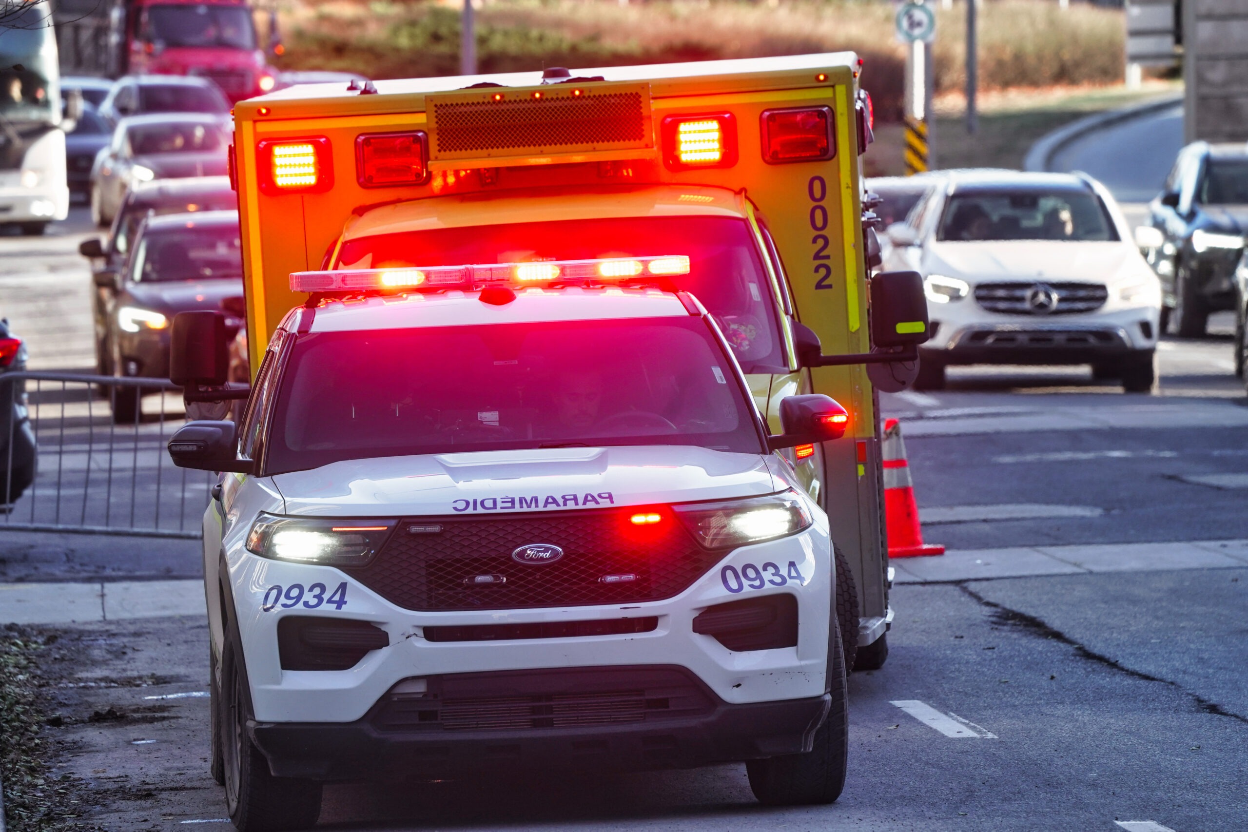 Emergency vehicles on city street
